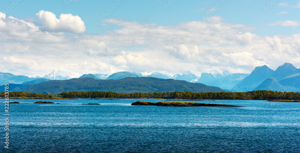 Sunny morning near the ferry moorage in norwegian village. North sea view, Norway, Europe