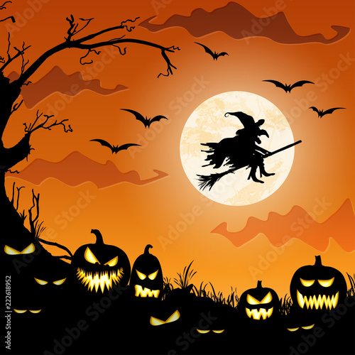 Halloween witch in front of full moon
