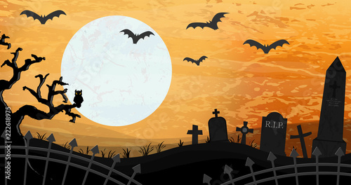 Halloween graveyard and bats in front of full moon