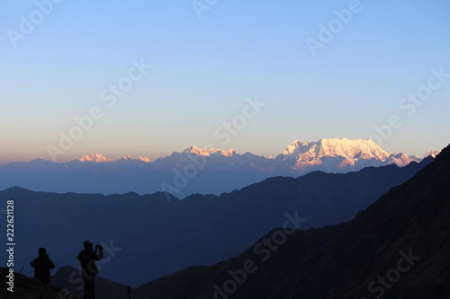 View of Mount Chaukhamba in the Uttarakhand Himalayas, India during sunrise as seen from the hiking trail to Roopkund Lake.