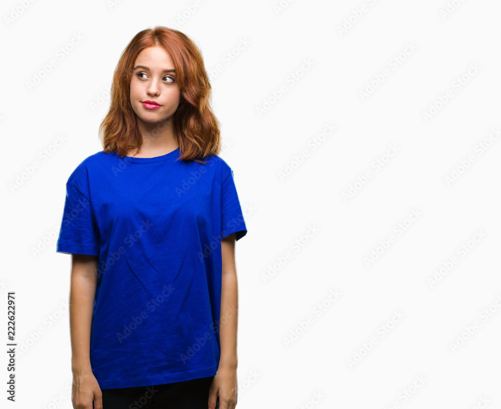 Young beautiful woman over isolated background smiling looking side and staring away thinking. Young beautiful woman over isolated background smiling looking side and staring away thinking.