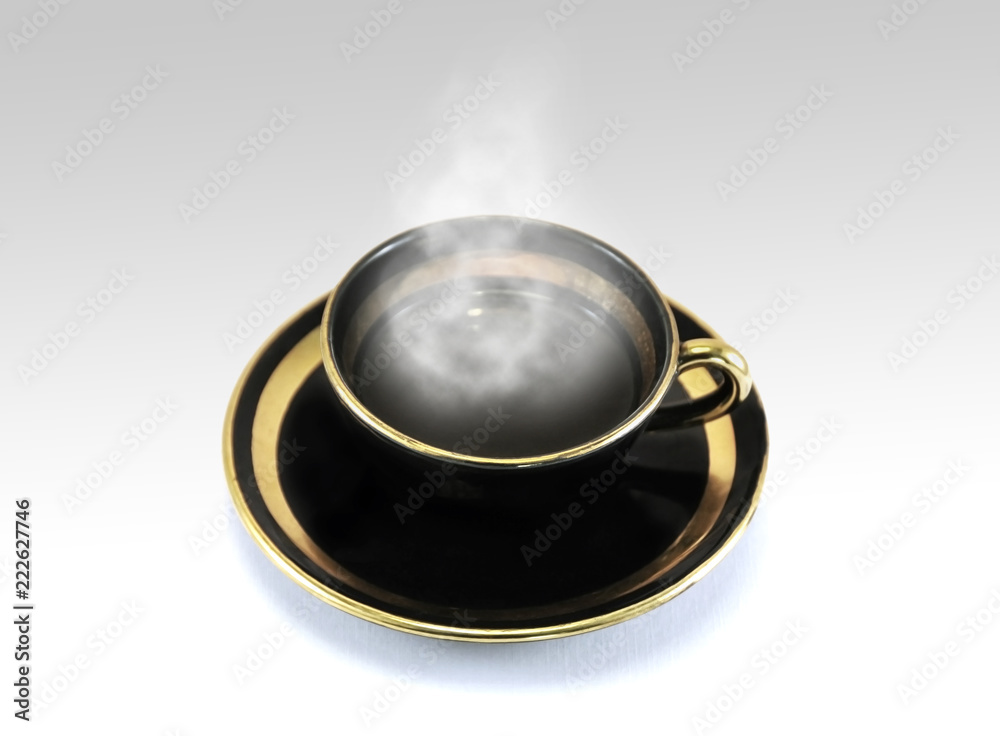 Hot drink (coffee or tea) in an old classy vintage cup decorated with a gold line. Hot steam rises from the cup.