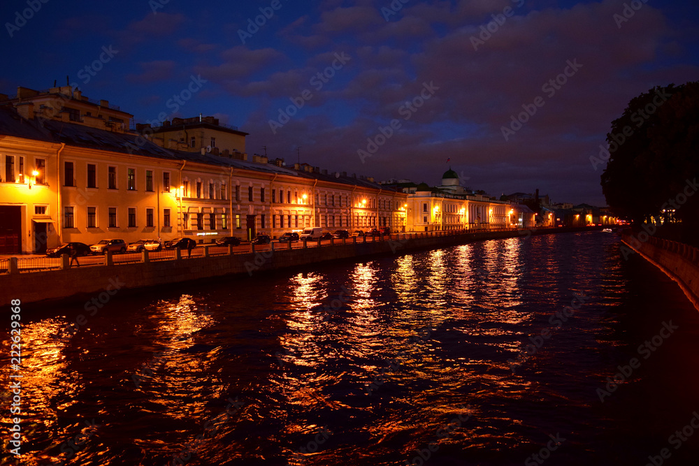 Night city of Saint Petersburg with lights reflecting in the water
