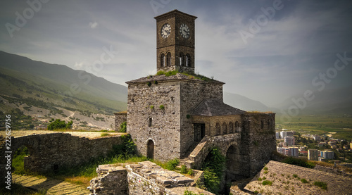 Panoramic view to Gjirokastra castle with the wall, tower and Clock, Gjirokaster, Albania photo
