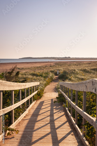 Sandy boardwalk to a Prince Edward island beach at sun rise