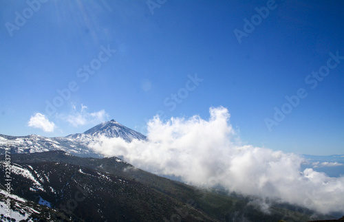 View of El Teide from the north side. Snowy and covered in clouds. Tenerife, Canary Islands