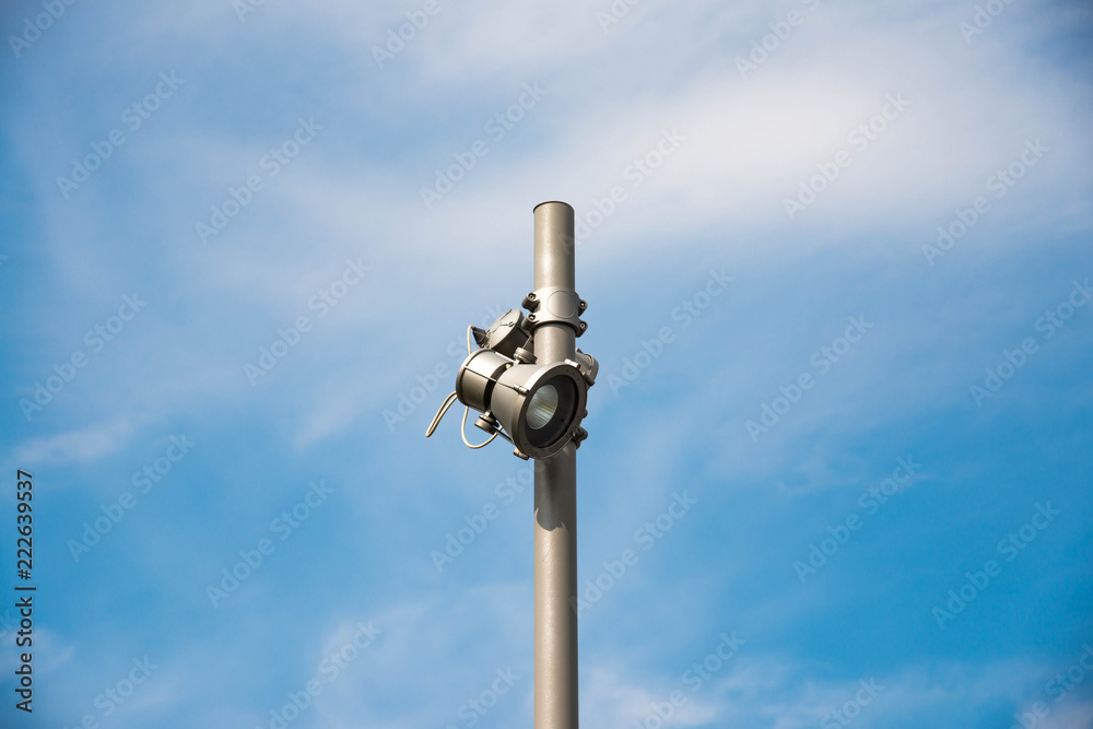 Led street light , blue sky with white clouds on the background.