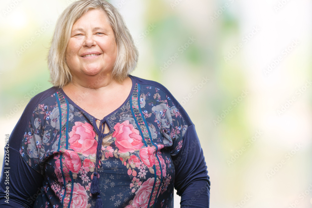 Senior plus size caucasian woman over isolated background smiling and looking at the camera pointing with two hands and fingers to the side. Senior plus size caucasian woman over isolated background smiling and looking at the camera pointing with two hands and fingers to the side.