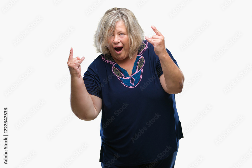 Senior plus size caucasian woman over isolated background smiling and looking at the camera pointing with two hands and fingers to the side.