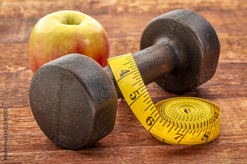 vintage iron dumbbell on wood