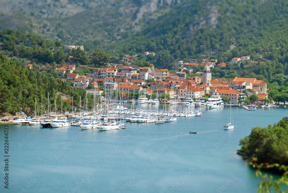 Skradin city and bay with ships and yachts in Croatia.