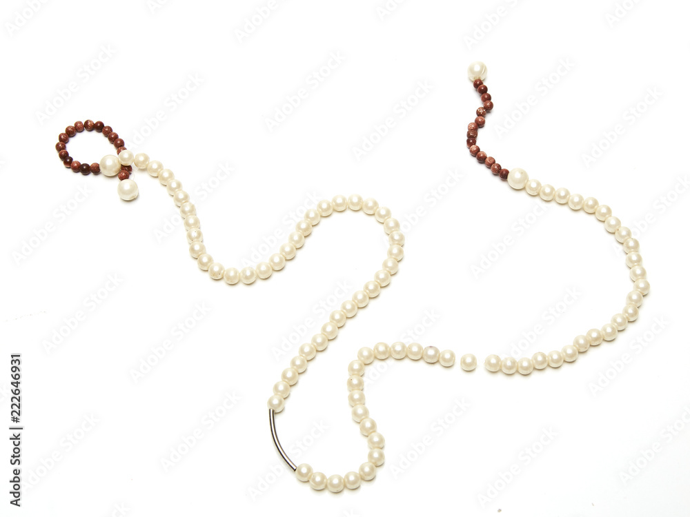 NATURAL PEARL NECKLACE ON WHITE NATURAL PEARL NECKLACE ON WHITE