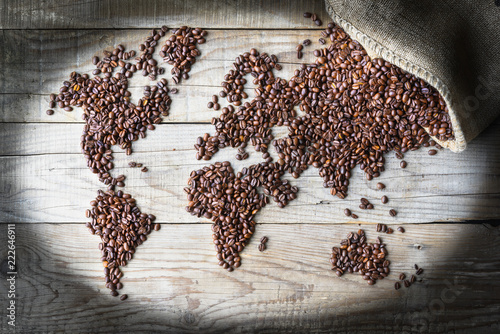 World of Coffee - fresh roasted coffee beans conceptual background