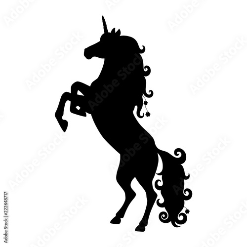 Isolated black silhouette of rearing unicorn on white background. Side view.