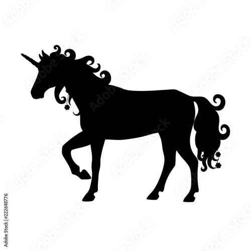 Isolated black silhouette of standing unicorn on white background. Side view.