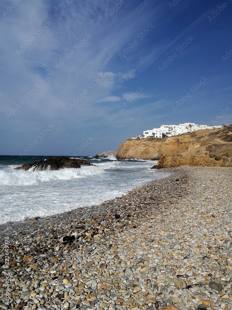 Walking on the beach. Bright day on greek island!