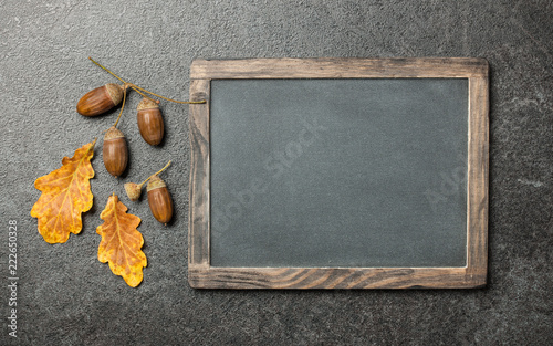 Thanksgiving card with oak leaves, acorns and chalk board