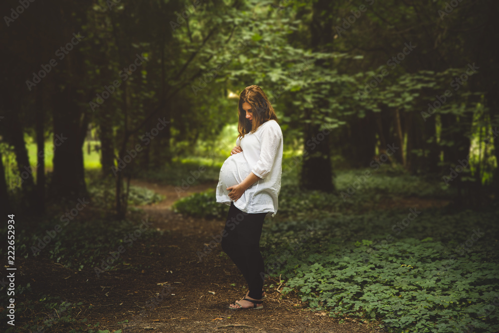 lonely mature pregnant woman in the park lonely mature pregnant woman in the park