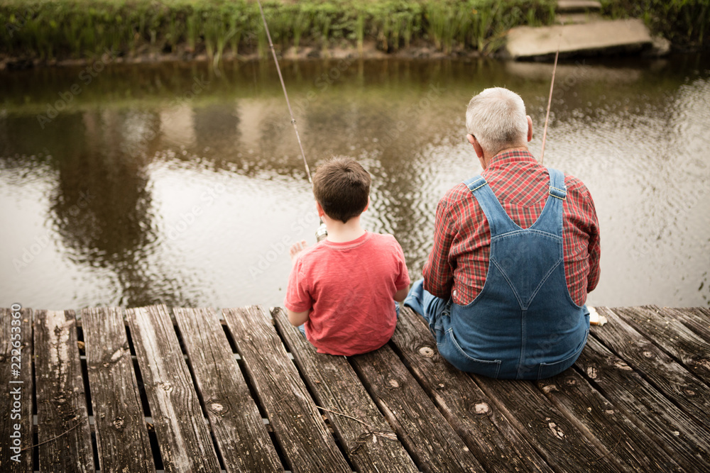 Happy Great Grandfather and Grandson Fishing Together - obrazy, fototapety, plakaty 