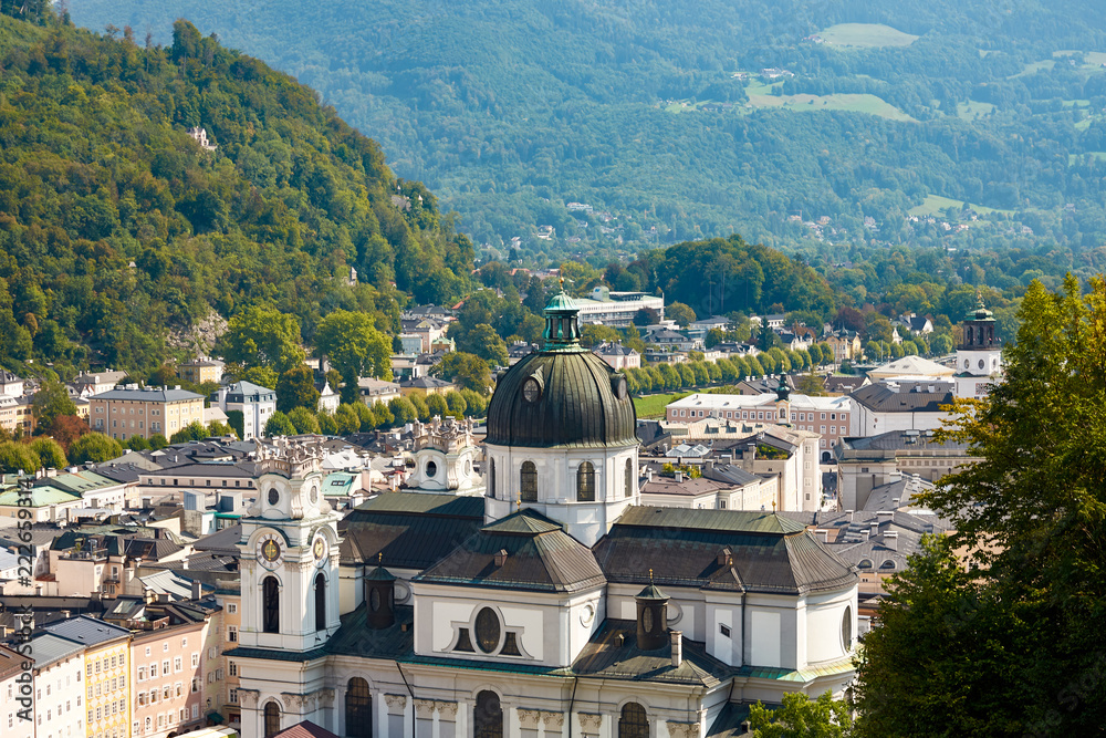 View of the Austrian city of Salzburg and the Dome church, with other buildings and mountains