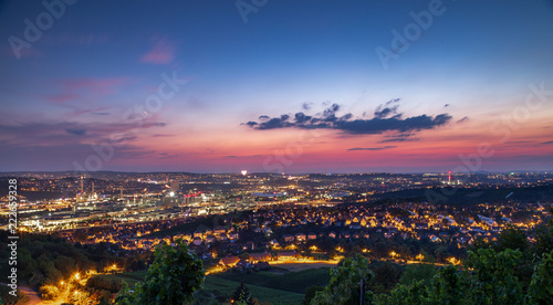 Fototapeta Naklejka Na Ścianę i Meble -  Red and Purple Sunset Over City of Stuttgart Germany on Summer Evening