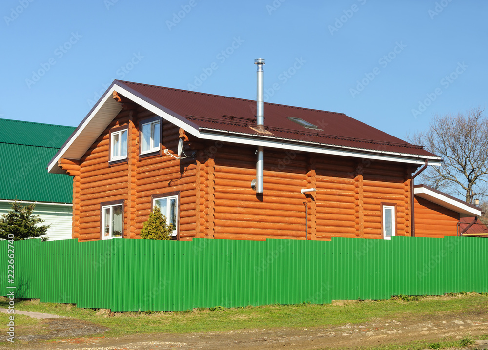 Obraz premium New wooden house, spring
