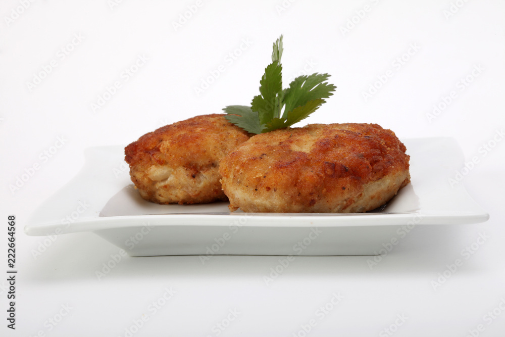 roasted pork and beef cutlets on plate roasted pork and beef cutlets on plate