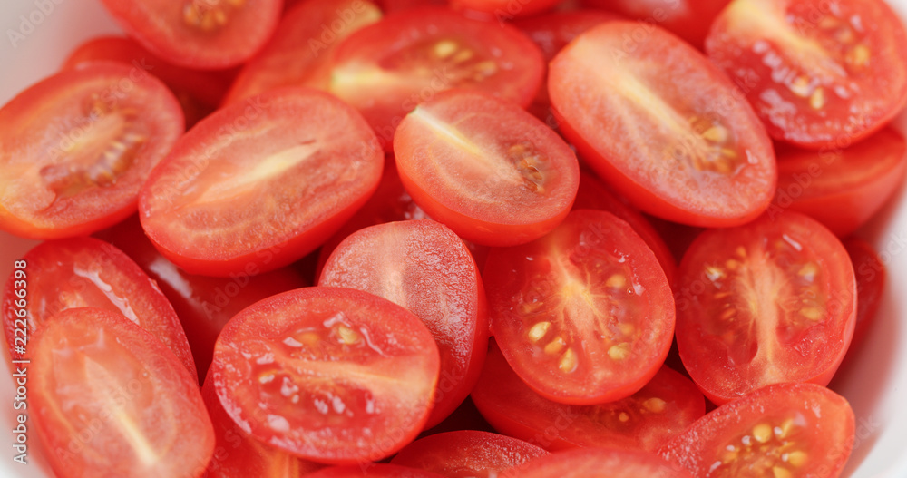 Stack of Fresh cherry tomato in bowl Stack of Fresh cherry tomato in bowl