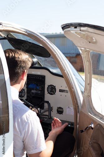 Konstfotografi Light aircraft pilot sitting in cockpit