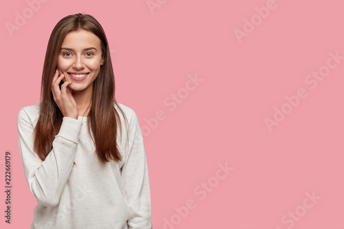 Positive emotions and good mood concept. Beautiful young brunette woman with ...