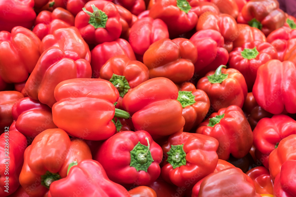 Background of red bell peppers at the city market Background of red bell peppers at the city market