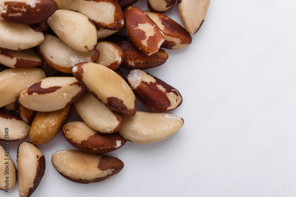 brazil nut on a white acrylic background brazil nut on a white acrylic background