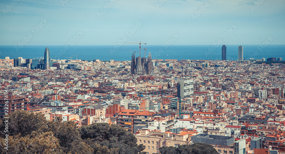 the city of Barcelona in the summer season with its monuments