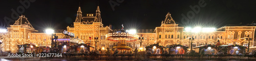 Panoramic view on GUM in festive Christmas and New Year time at winter, Red square, Moscow, Russia. Xmas celebration in Moscow with lights decoration of GUM.