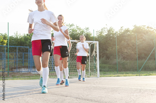 Handball female players running