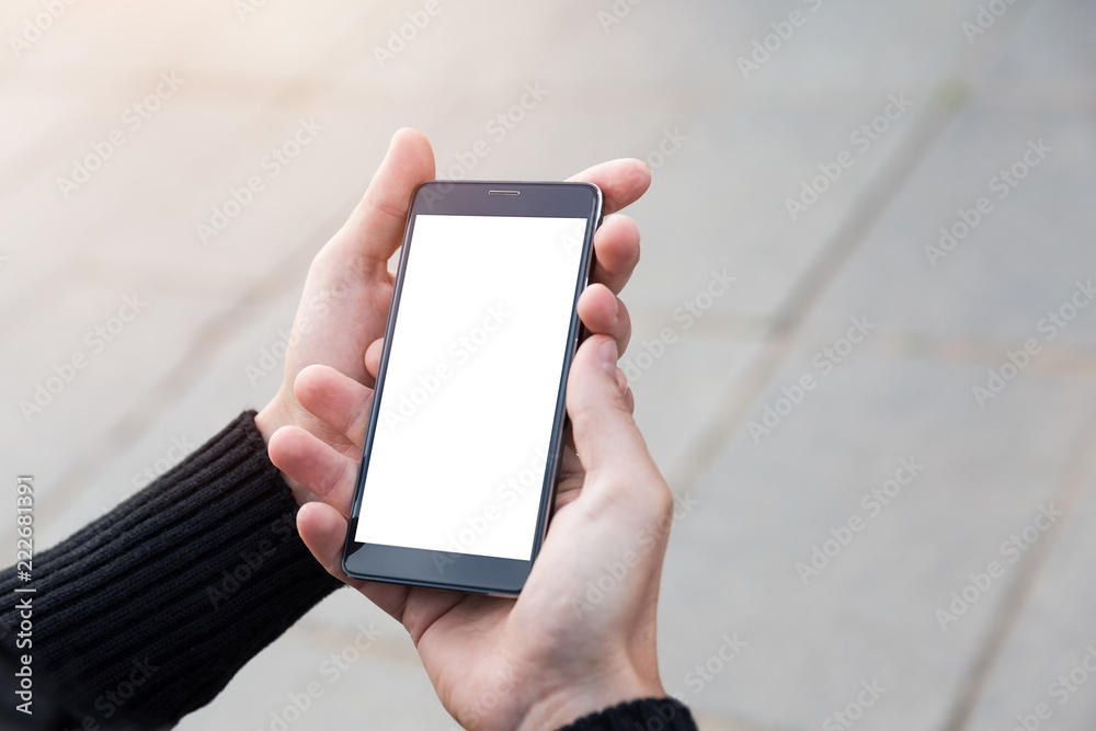 Man uses his mobile phone outdoor