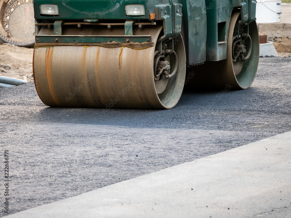 Road Construction Site In Berlin, Germany: Steamroller At Asphalt Pavement Works
