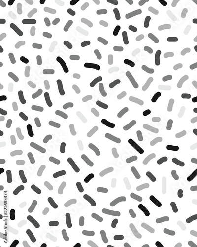 Seamless pattern with confetti on a white background