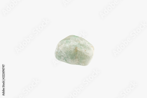 Jadeite raw stone from India isolated. Macro shooting.