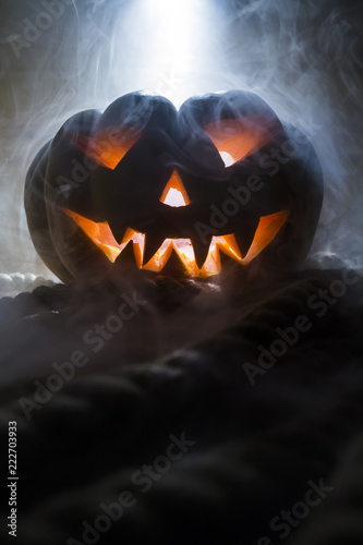 Jack-o-lantern Halloween pumpkin head. Scary evil face spooky holiday. Halloween part. Halloween attributes.