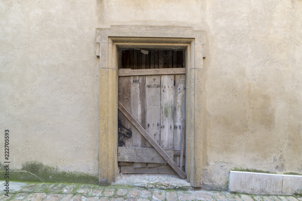 antique entrance door, wood and metal and window