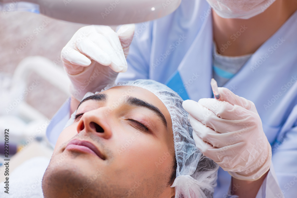 Man visiting doctor for plastic surgery Man visiting doctor for plastic surgery