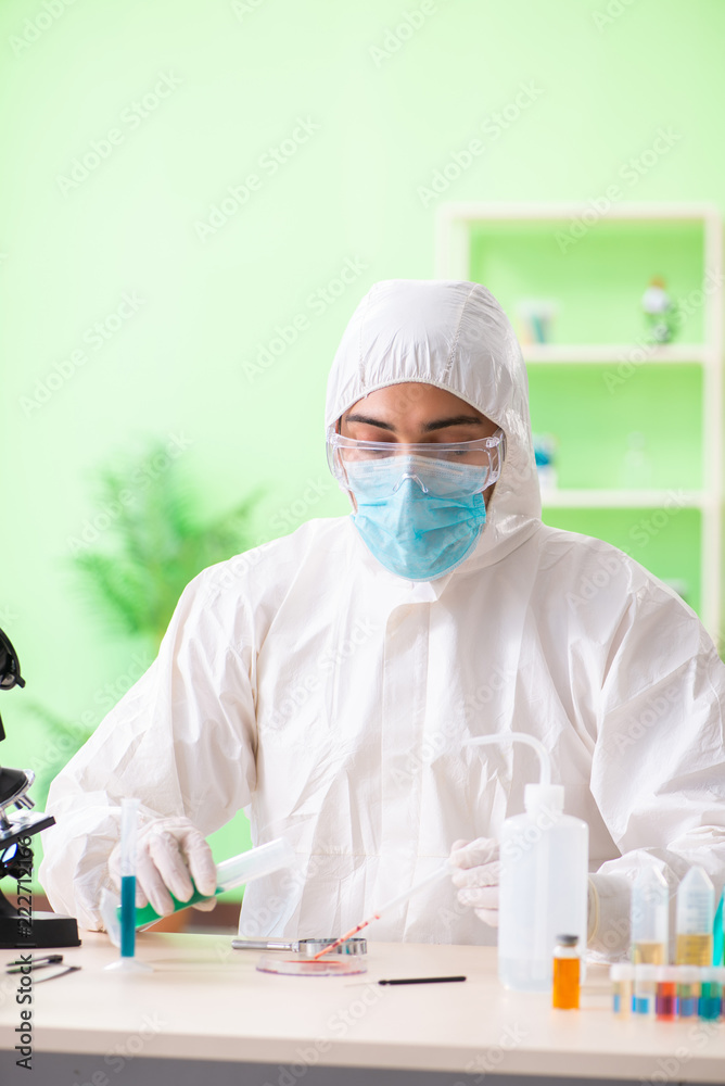 Chemist working in the lab on new experiment Chemist working in the lab on new experiment