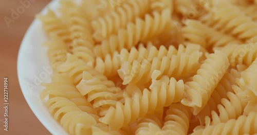 Stack of fusill on plate photo