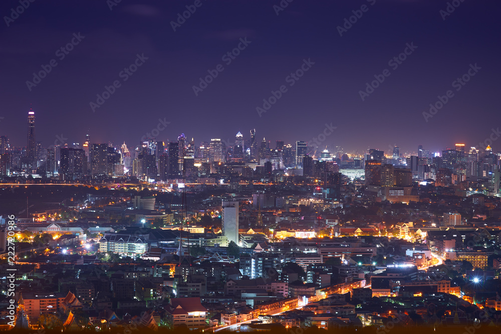 night cityscape with light tail speed line in metropolis