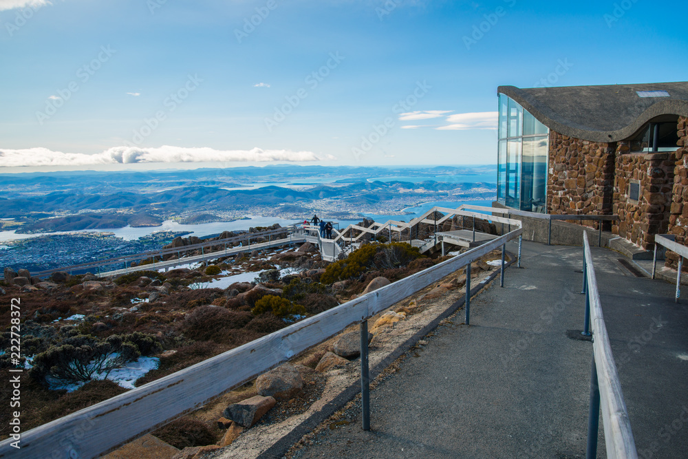 The wind shelter building on the summit of Mount Wellington, you can see the panorama view of Hobart the capital city of Tasmania state of Australia from above. The wind shelter building on the summit of Mount Wellington, you can see the panorama view of Hobart the capital city of Tasmania state of Australia from above.