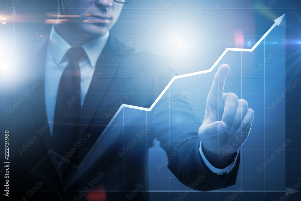 BUsinessman pressing virtual button on diagram chart
