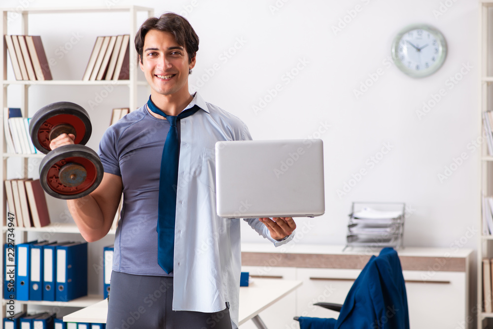 Employee combining work and healthy lifestyle Employee combining work and healthy lifestyle