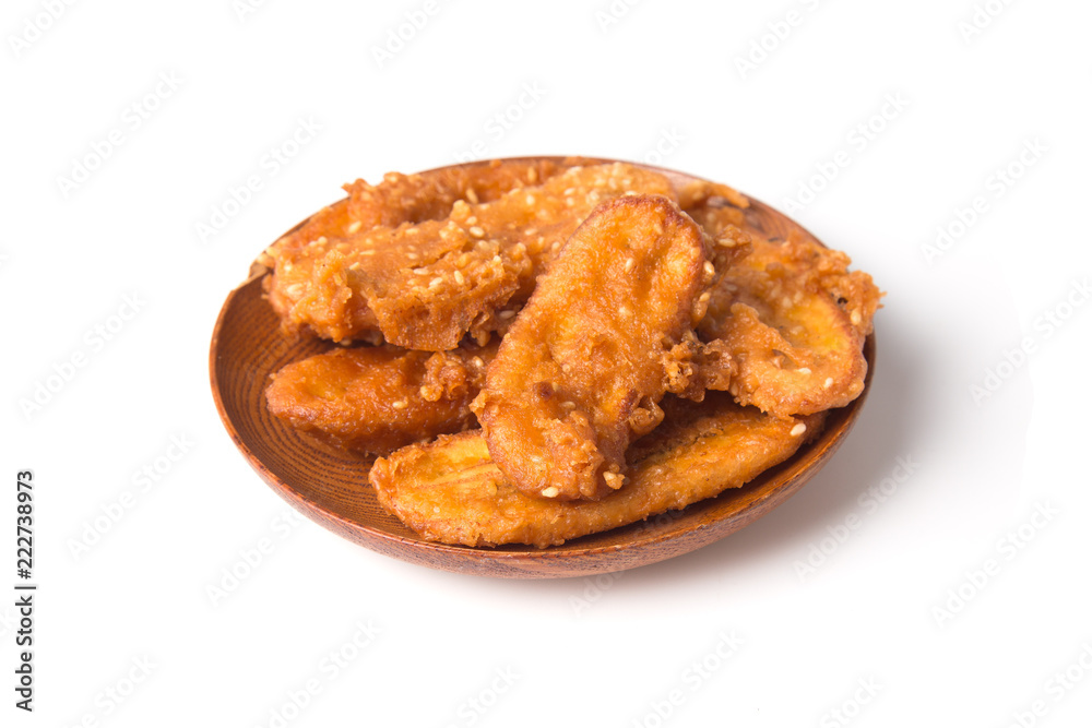 Fried bananas in plate isolated on white background, Kluay Tod - Thai dessert. Fried bananas in plate isolated on white background, Kluay Tod - Thai dessert.