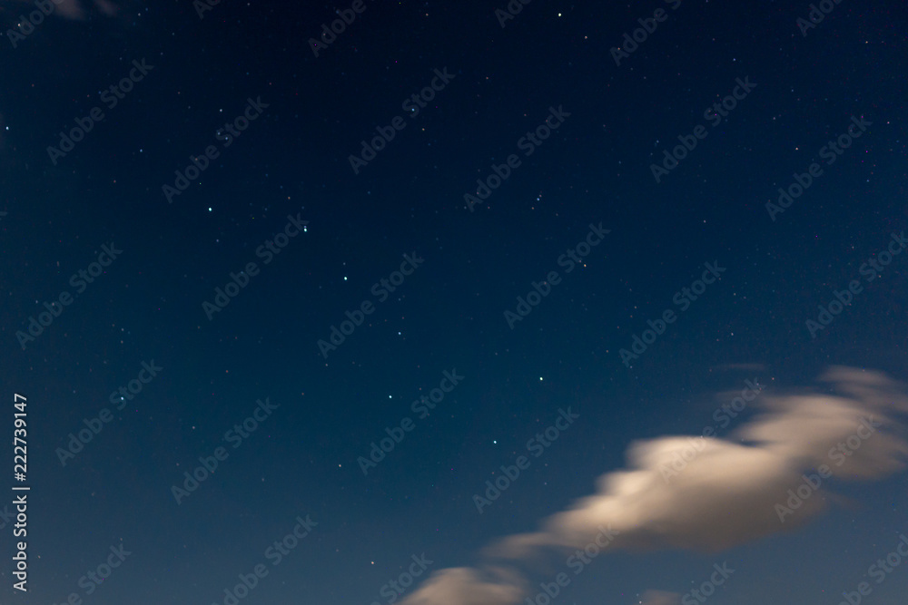 Fototapeta premium Ursa Major constellation in night sky with clouds